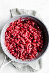 warm cranberry sauce in blue pan on a cloth