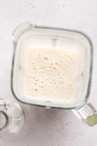 Potato milk in a blender from the top.