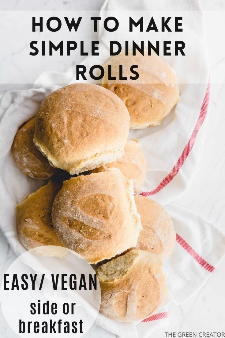 baked dinner rolls on white napkin with red lines on a white backdrop with pinterest text