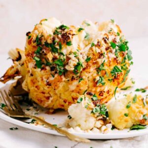 cropped-PERFECT-Whole-Roasted-Cauliflower-4-ingredients-perfectly-tender-vegan-glutenfree-cauliflower-plantbased-recipe-TheGreenCreator-1.jpg