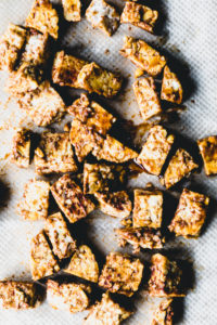 marinated tempeh on brown parchment paper