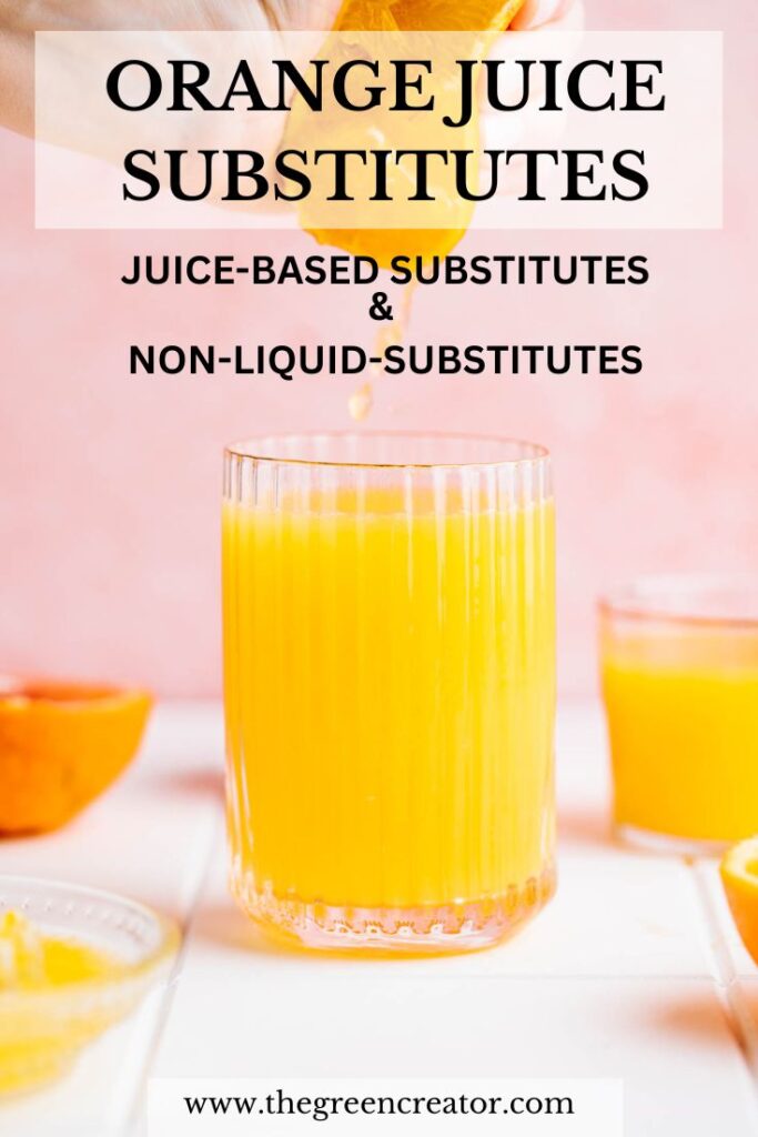 A glass with orange juice on a white table with a pink backdrop with oranges and more cups of orange juice next to it and a hand squeezing in more orange juice from an orange with text on top.